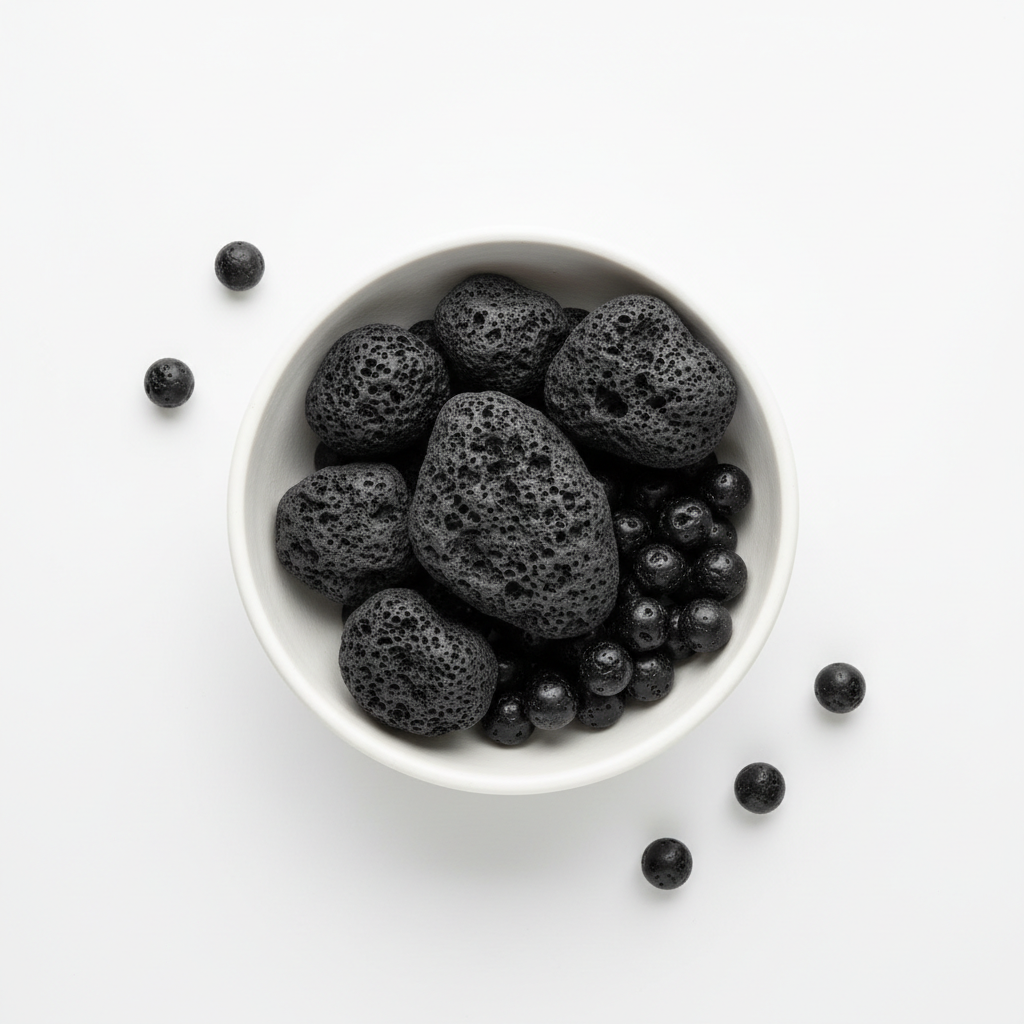 Black lava stone swatch in white bowl