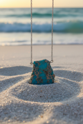 Raw Turquoise Necklace Close-Up Beach